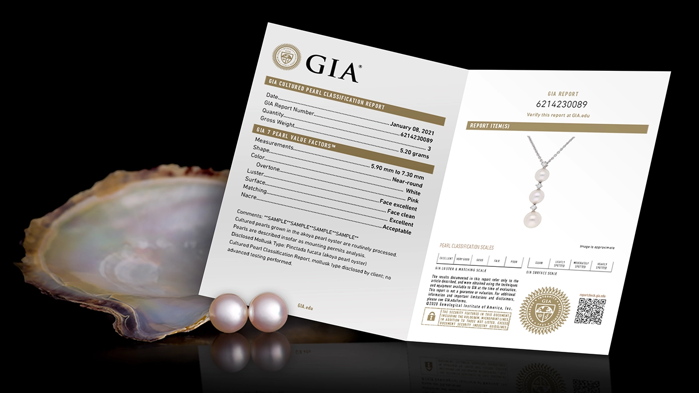GIA pearl report displayed with pearl earrings and an open oyster shell. GIA pearl report displayed with pearl earrings and an open oyster shell.