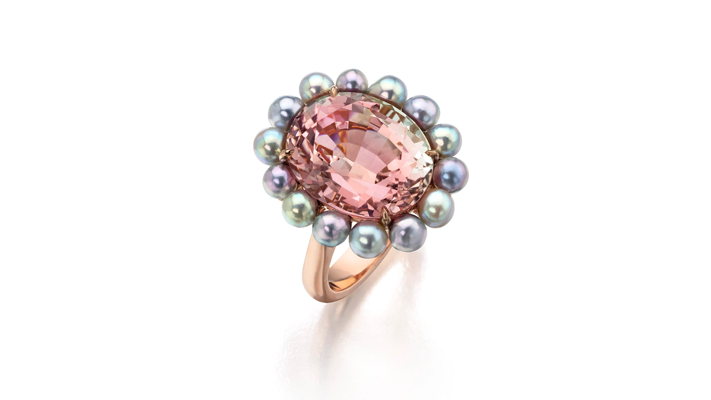 Bicolor tourmaline ring with a halo of blue akoya pearls Bicolor tourmaline ring with a halo of blue akoya pearls
