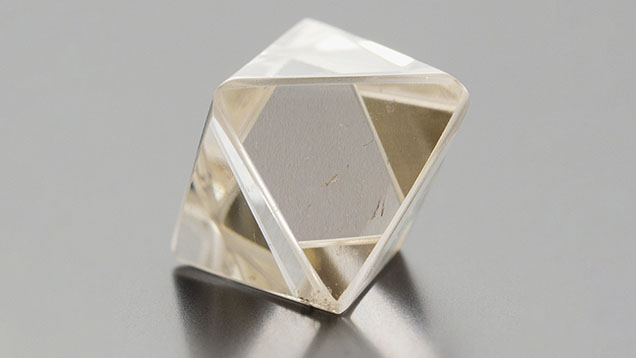Figure 1. A 6.87 ct CVD-grown synthetic diamond, measuring approximately 11 mm across, fashioned in the approximate shape of an octahedron. Photo by Danny Bowler.