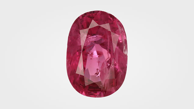 Figure 1. This 3.37 ct purplish red oval mixed cut was submitted as a ruby. Photo by Tony Leung Yik Hang.