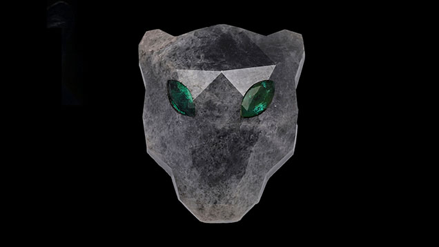 This piece, a diamond cut into the shape of a panther face and set with two natural Zambian emeralds, has a total weight of 67.18 ct. Photo by Gourav Bera.