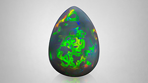 Figure 1. A natural 47.77 ct Ethiopian opal with an unusual play-of-color pattern. Photo by Nuttapol Kitdee. Figure 1. A natural 47.77 ct Ethiopian opal with an unusual play-of-color pattern. Photo by Nuttapol Kitdee.