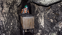Pushing carts of ore through the tunnels at Los Españoles