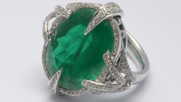 Beryl and topaz doublet resembling emerald Beryl and topaz doublet resembling emerald