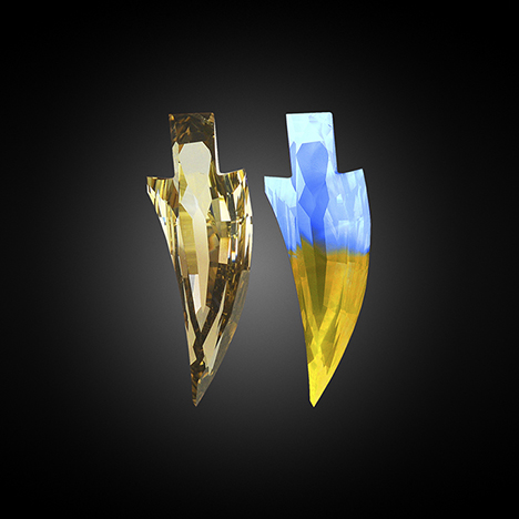 Interesting fluorescence pattern of the sword-shaped diamond. Interesting fluorescence pattern of the sword-shaped diamond.