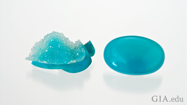 Drusy quartz sits on top of Chrysocolla, right, and a polished oval cabaochon of Chrysocolla.  