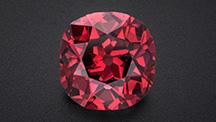 Figure 1. The 2.33 ct Winston Red diamond, displaying a vibrant Fancy red color. The old mine brilliant-cut stone measures approximately 8 mm in diameter. Photo by Robert Weldon; courtesy of Ronald Winston. Figure 1. The 2.33 ct Winston Red diamond, displaying a vibrant Fancy red color. The old mine brilliant-cut stone measures approximately 8 mm in diameter. Photo by Robert Weldon; courtesy of Ronald Winston.