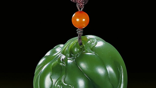 Large, round antique pendant with a smooth surface