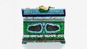 The front of the “Blue Boy” chest features two wing-like “conk” wood opal slices from Nevada. The front of the “Blue Boy” chest features two wing-like “conk” wood opal slices from Nevada.