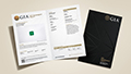 A GIA certificate and a black folder, showcasing a gemstone with details on the left and a sleek cover on the right.