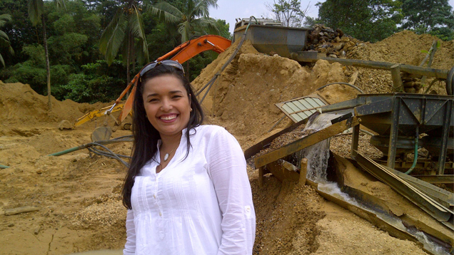 Karyna Sena stands in front of a sapphire mine near Colombo, Sri Lanka.