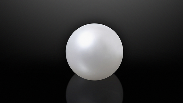 White round nacreous pearl.