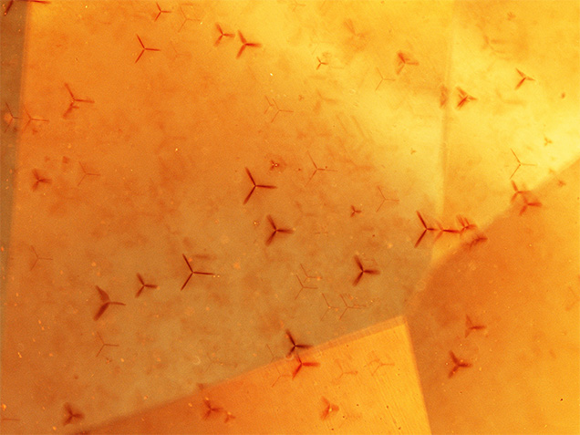 Windmill-like inclusions seen in sphalerite. Windmill-like inclusions seen in sphalerite.