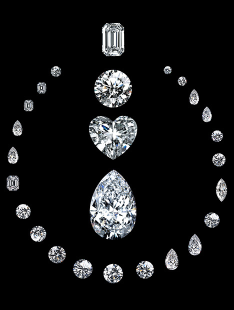 Diamonds cut from the Lesotho Promise are arranged in the shape of a necklace, which surrounds an emerald cut, round brilliant cut, heart-shaped and pear-shaped diamonds.