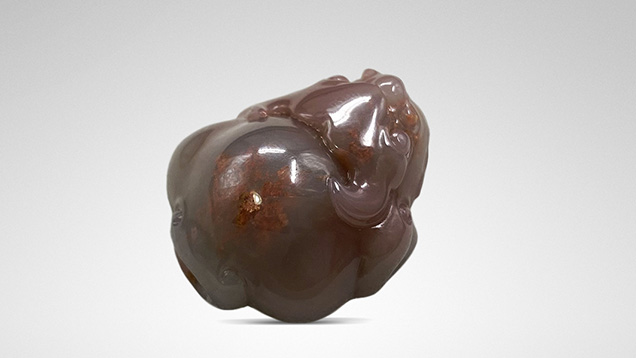 Gray-purple pendant identified as agate. Gray-purple pendant identified as agate.
