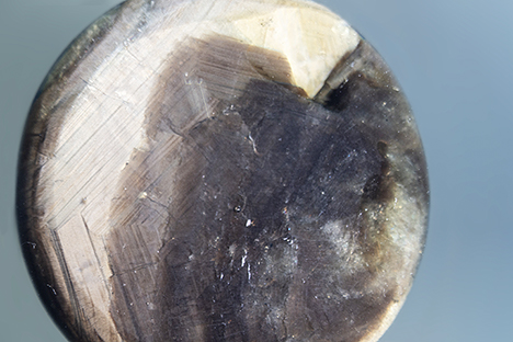 Glass filling covers a large portion of the base of the star sapphire. Glass filling covers a large portion of the base of the star sapphire.