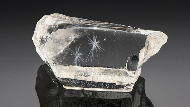 3D internal laser engraving created these two white stellate inclusions in quartz. 3D internal laser engraving created these two white stellate inclusions in quartz.