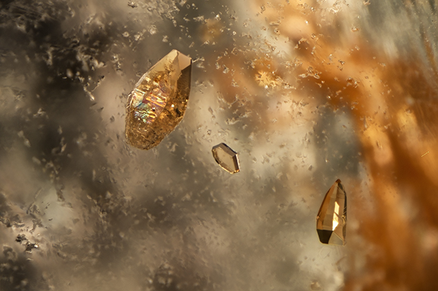 Three parasite crystals in Colombian rock quartz Three parasite crystals in Colombian rock quartz