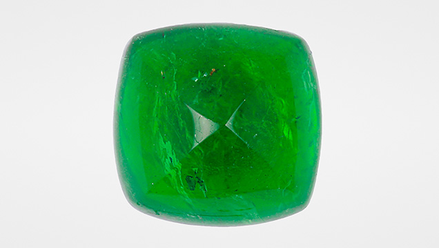 This Zambian emerald displays a highly saturated green color This Zambian emerald displays a highly saturated green color