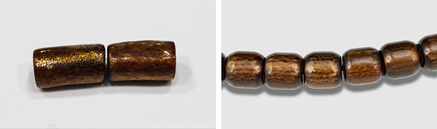 Comparison of golden coral and plastic beads