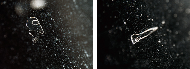 Two-phase inclusions seen in synthetic quartz bangle. Two-phase inclusions seen in synthetic quartz bangle.