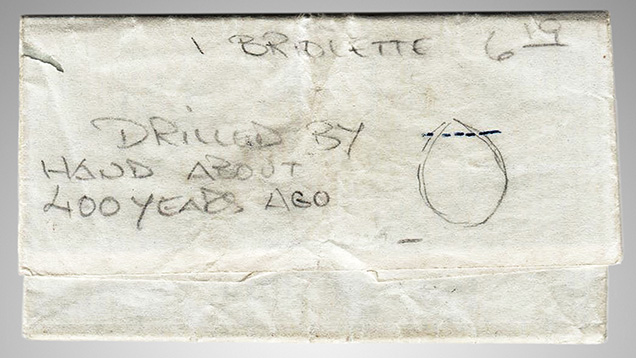 Diamond paper containing the briolette.