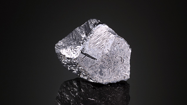 This Pakistani hematite crystal has a geometric outer skin of rutile.