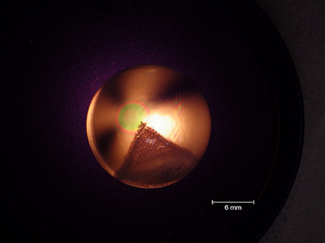 The optic axis in relation to the “phantom” engraving.