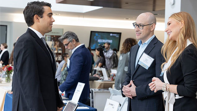 Alishan Halebian, Owner/Designer, Alishan counsels with attendee at GIA Jewelry Career Fair. Alishan Halebian, Owner/Designer, Alishan counsels with attendee at GIA Jewelry Career Fair.