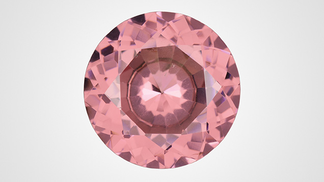 A 7.26 ct modified round brilliant identified as pink pyrope garnet. Photo by Towfiq Ahmed; courtesy of Bill Vance. A 7.26 ct modified round brilliant identified as pink pyrope garnet. Photo by Towfiq Ahmed; courtesy of Bill Vance.