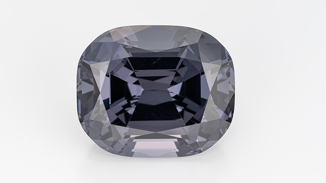 A 69.96 ct antique cushion-cut gray spinel by David Nassi. A 69.96 ct antique cushion-cut gray spinel by David Nassi.