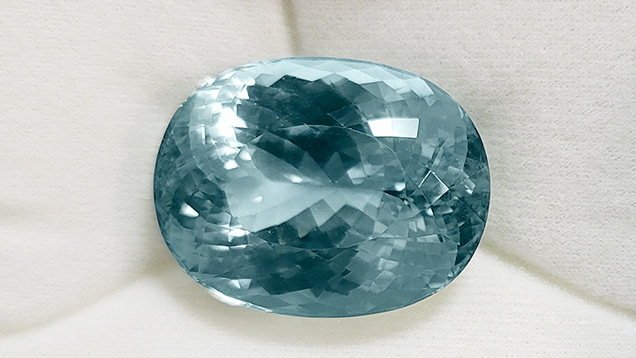Spodumene from Afghanistan cut to enhance a blue color rather than green.
