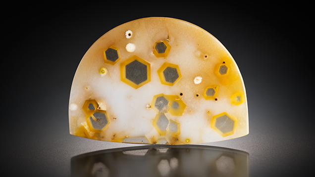 Chalcedony plate with quartz windows.