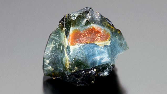Pyrite inclusions in a green common opal produce a pleasing aventurescence. Pyrite inclusions in a green common opal produce a pleasing aventurescence.