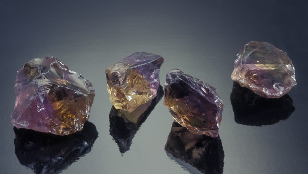 Ametrine Crystals. The Anahi mine in eastern Bolivia is the source of these rough ametrine crystals. Photo by Robert Weldon/GIA, courtesy Bart Curren.