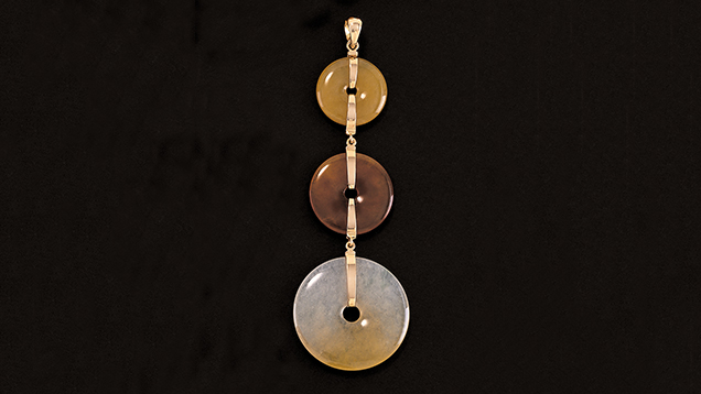 Pi Jade Carving. The simple elegance of the disk-shaped Chinese eternity symbol, or bi, carries great spiritual significance for many Asians. - Courtesy Mason-Kay Fine Jade Jewelry