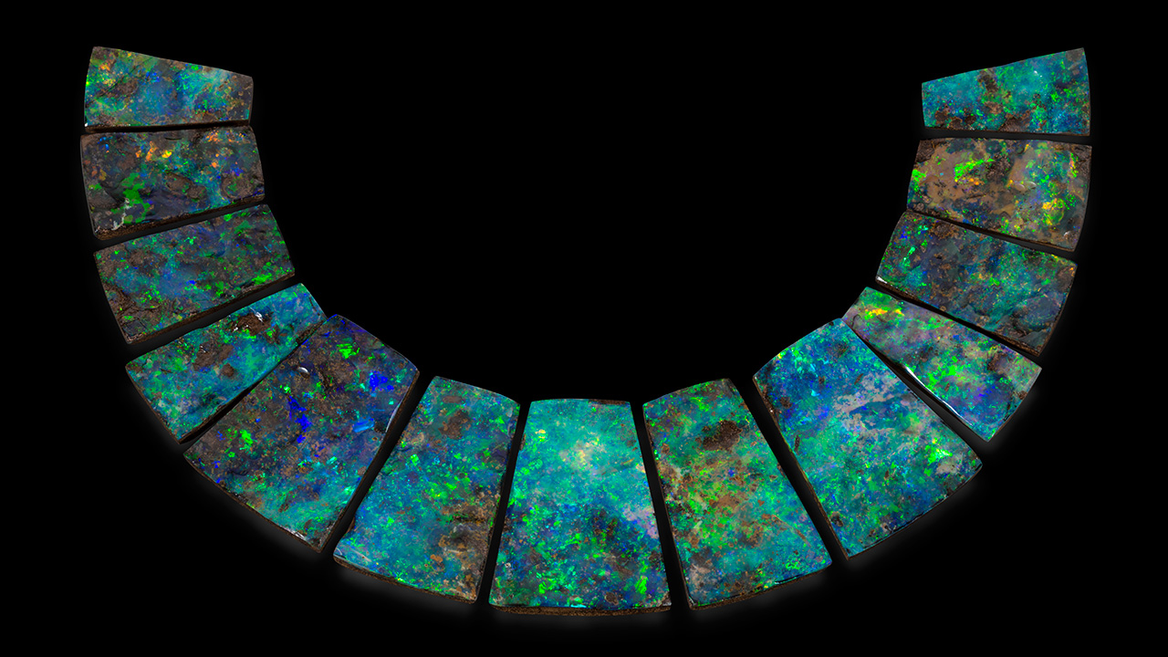 Boulder-opal-Queensland-VRL-183718-1280x720.jpg. These boulder opals were cut for a necklace. Photo by Robert Weldon/GIA.