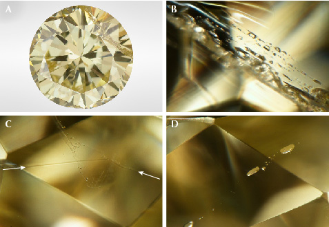 A series of healed fractures with silicate melt inclusions in a yellow diamond. A series of healed fractures with silicate melt inclusions in a yellow diamond.