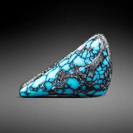 A 9.32 ct backed turquoise from China. A 9.32 ct backed turquoise from China.