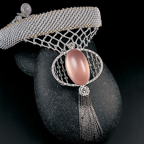 Knotted necklace with rose quartz pendant Knotted necklace with rose quartz pendant