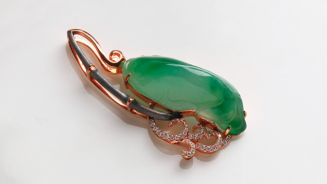 Jadeite carving with fishing motif Jadeite carving with fishing motif