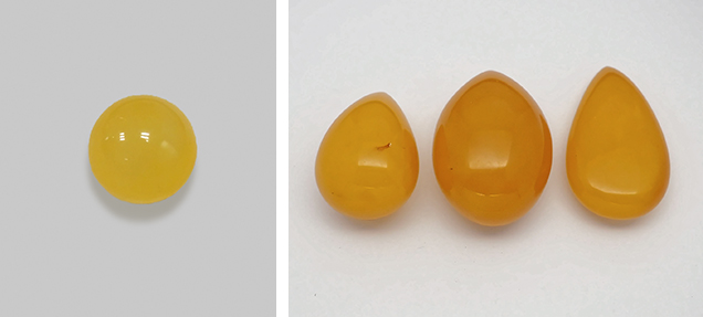 Steam-dyed “chicken-fat yellow beeswax” amber. Steam-dyed “chicken-fat yellow beeswax” amber.