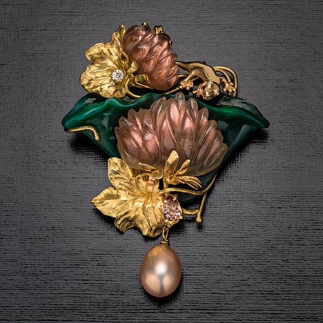 Pin/pendant with sunstone, pearl, diamond, chalcedony, and zircon. Pin/pendant with sunstone, pearl, diamond, chalcedony, and zircon.