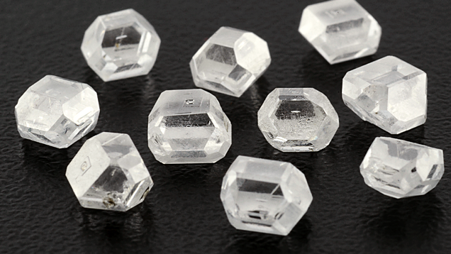 Near-colorless HPHT-grown diamond crystals. Near-colorless HPHT-grown diamond crystals.