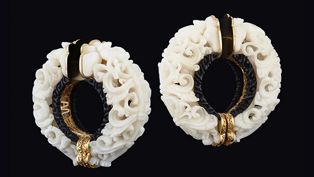 Carved tagua seed hoop earrings. Carved tagua seed hoop earrings.
