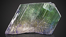 Large rough spodumene crystal exhibiting pleochroism.