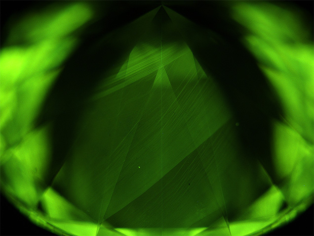 DiamondView image showing green fluorescence and growth striations in a CVD-grown diamond. DiamondView image showing green fluorescence and growth striations in a CVD-grown diamond.
