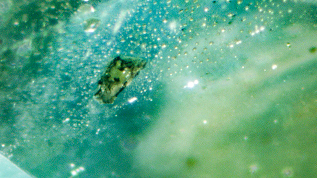 First documented topaz crystal inclusion in sapphire First documented topaz crystal inclusion in sapphire
