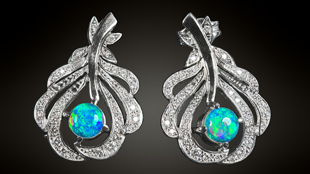 Figure 19. White gold earrings containing Slovak Opal (0.72 ct total) and diamonds. Photo by Albert Russ; courtesy of Great Rent JSC. Figure 19. White gold earrings containing Slovak Opal (0.72 ct total) and diamonds. Photo by Albert Russ; courtesy of Great Rent JSC.