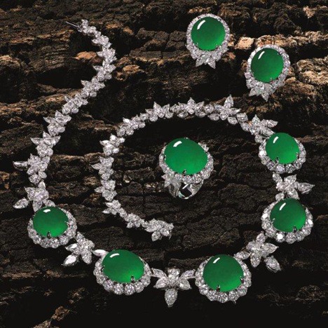 This jade and diamond set of necklace and earrings drew a winning bid of $3.78 million at the Tiancheng International auction in Hong Kong. The eight jade cabochons measured 20.13 mm x 17.13 mm x 9.73 mm and were set with 73.55 carats of diamonds. Courtesy of Tiancheng International. This jade and diamond set of necklace and earrings drew a winning bid of $3.78 million at the Tiancheng International auction in Hong Kong. The eight jade cabochons measured 20.13 mm x 17.13 mm x 9.73 mm and were set with 73.55 carats of diamonds. Courtesy of Tiancheng International.